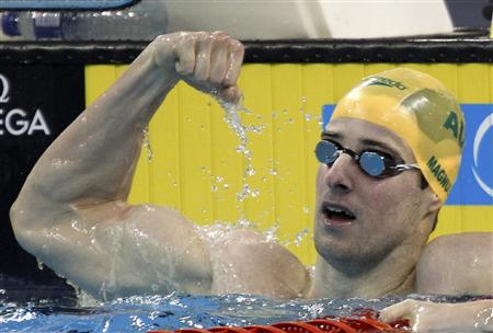 Australia's Magnussen reacts after winning his men's 100m freestyle semifinal at the 14th FINA World Championships in Shanghai