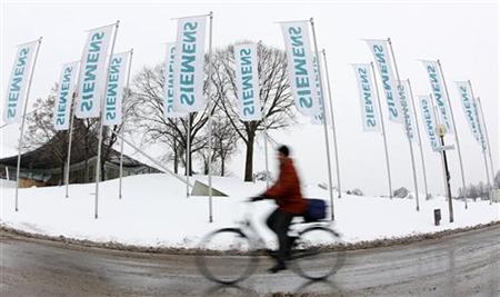 Shareholder arrives for Siemens annual shareholders meeting in Munich Shareholder arrives for Siemens annual shareholders meeting in Munich