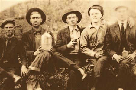 Unidentified moonshiners in the early spring of 1918 on Lister Road near Gowensville, South Carolina. REUTERS/Dean Campbell Unidentified moonshiners in the early spring of 1918 on Lister Road near Gowensville, South Carolina. REUTERS/Dean Campbell