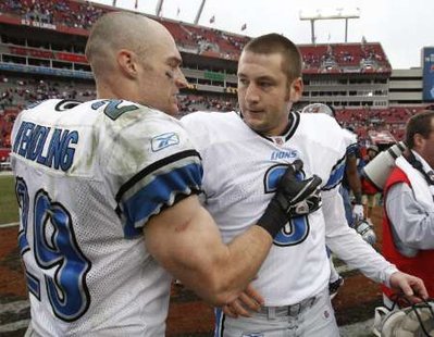 Detroit Lions safety John Wendling (29) congratulates place kicker Dave Rayner (3) after he kicked a field goal at the end of regulation and one in overtime to defeat the Tampa Bay Buccaneers in Tampa, Florida December 19, 2010. REUTERS Detroit Lions safety John Wendling (29) congratulates place kicker Dave Rayner (3) after he kicked a field goal at the end of regulation and one in overtime to defeat the Tampa Bay Buccaneers in Tampa, Florida December 19, 2010. REUTERS