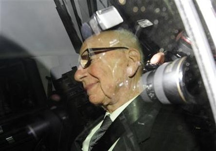 News Corp chairman Rupert Murdoch is driven from his apartment in London