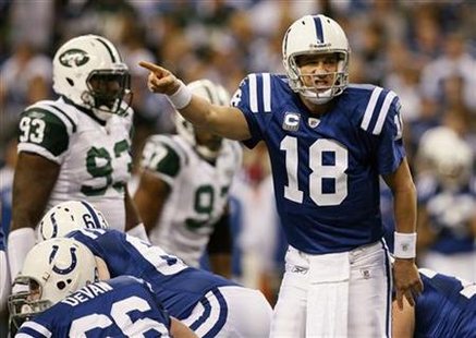 Indianapolis Colts quarterback Peyton Manning calls a play against the New York Jets during their AFC Wild Card NFL playoff football game in Indianapolis Colts quarterback Peyton Manning calls a play against the New York Jets during their AFC Wild Card NFL playoff football game in