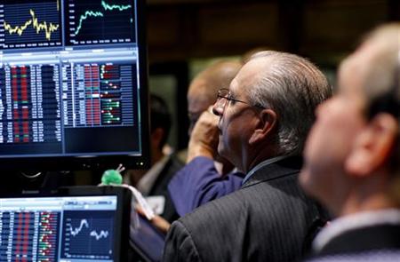 Traders work on the main trading floor of the New York Stock Exchange Traders work on the main trading floor of the New York Stock Exchange