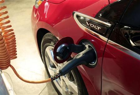 A Chevrolet Volt electric vehicle is plugged into a charging station during a news conference in Rochester Hills A Chevrolet Volt electric vehicle is plugged into a charging station during a news conference in Rochester Hills