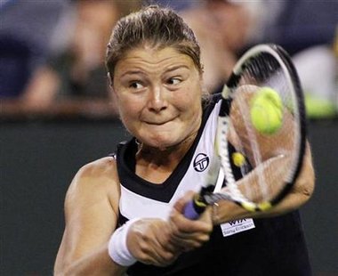 Safina returns a shot against Sharapova at the Indian Wells WTA tennis tournament in Indian Wells, California Safina returns a shot against Sharapova at the Indian Wells WTA tennis tournament in Indian Wells, California