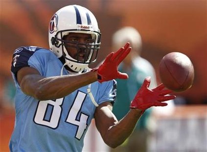 Tennessee Titans' Randy Moss catches a pass during warms-up prior to their NFL football game against the Miami Dolphins in Miami Tennessee Titans' Randy Moss catches a pass during warms-up prior to their NFL football game against the Miami Dolphins in Miami
