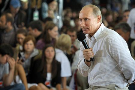 Russian Prime Minister Putin answers questions from the audience during his visit to the summer camp of the pro-Kremlin youth group "Nashi" Russian Prime Minister Putin answers questions from the audience during his visit to the summer camp of the pro-Kremlin youth group "Nashi"