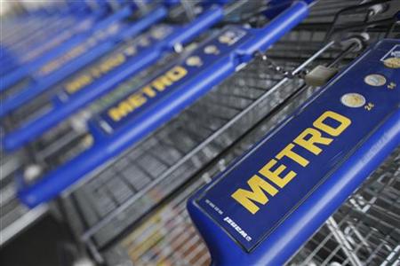 Shopping carts of Germany's biggest retailer Metro AG are lined up at a Metro cash and carry market in St. Augustin Shopping carts of Germany's biggest retailer Metro AG are lined up at a Metro cash and carry market in St. Augustin