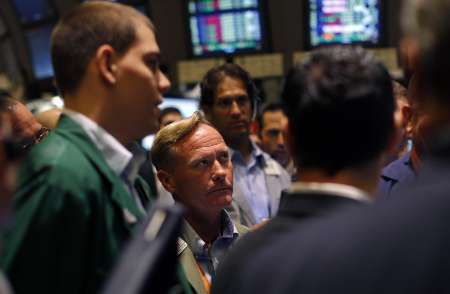 Traders work on the main trading floor of the New York Stock Exchange July 29, 2011. U.S stocks dropped for a fifth straight day on Friday after weak data on the economy and a setback on a debt deal discouraged investors, pushing the S&P 500 briefly below a key technical level. REUTERS/Mike Segar (UNITED STATES - Tags: BUSINESS) Traders work on the main trading floor of the New York Stock Exchange July 29, 2011. U.S stocks dropped for a fifth straight day on Friday after weak data on the economy and a setback on a debt deal discouraged investors, pushing the S&P 500 briefly below a key technical level. REUTERS/Mike Segar (UNITED STATES - Tags: BUSINESS)