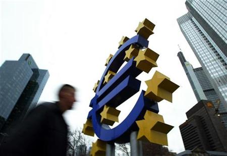 File photo of pedestrian walking by a huge Euro logo in front of the European Central Bank in Frankfurt File photo of pedestrian walking by a huge Euro logo in front of the European Central Bank in Frankfurt