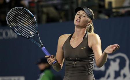 Russia's Maria Sharapova reacts during her Stanford Classic tennis match against Serena Williams of the U.S. in Stanford Russia's Maria Sharapova reacts during her Stanford Classic tennis match against Serena Williams of the U.S. in Stanford