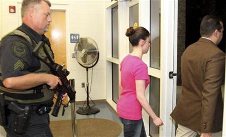 Casey Anthony and her lawyer Jose Baez leave the Orange County Jail in Orlando