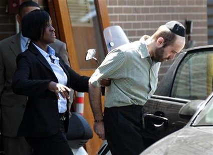 Murder suspect Levi Aron is escorted out of a New York Police Department precinct in Brooklyn Murder suspect Levi Aron is escorted out of a New York Police Department precinct in Brooklyn