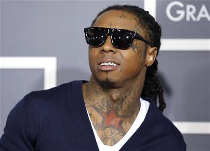 File photo of Lil Wayne posing on arrival at the 53rd annual Grammy Awards in Los Angeles File photo of Lil Wayne posing on arrival at the 53rd annual Grammy Awards in Los Angeles