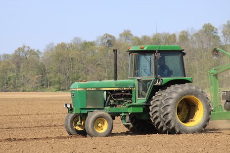 A tractor works on a field in a stock Reuters image. A tractor works on a field in a stock Reuters image.