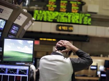 Trader works on the floor of the New York Stock Exchange Trader works on the floor of the New York Stock Exchange