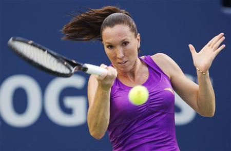 Jelena Jankovic of Serbia returns a shot to Julia Goerges of Germany during their match at the Rogers Cup women's tennis tournament in Toron Jelena Jankovic of Serbia returns a shot to Julia Goerges of Germany during their match at the Rogers Cup women's tennis tournament in Toron