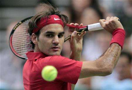 Switzerland's Federer hits a return to Portugal's Machado during their men's singles Davis Cup tennis match in Bern Switzerland's Federer hits a return to Portugal's Machado during their men's singles Davis Cup tennis match in Bern