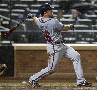 Atlanta Braves Dan Uggla hits solo home run against New York Mets in New York Atlanta Braves Dan Uggla hits solo home run against New York Mets in New York