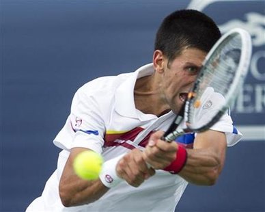 Serbia's Djokovic hits return to Russia's Davydenko at the Rogers Cup tennis tournament in Montreal Serbia's Djokovic hits return to Russia's Davydenko at the Rogers Cup tennis tournament in Montreal