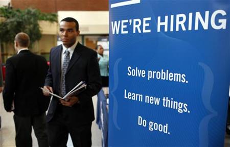 A job seeker walks the floor at a large career fair at Rutgers University in New Brunswick A job seeker walks the floor at a large career fair at Rutgers University in New Brunswick