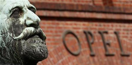 The statue of German car manufacturer Opel founder, Adam Opel is seen in front of the main gate at the headquarters in Ruesselsheim The statue of German car manufacturer Opel founder, Adam Opel is seen in front of the main gate at the headquarters in Ruesselsheim