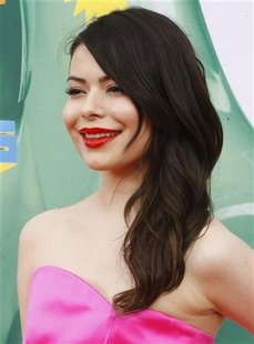 Actress Miranda Cosgrove poses at the 2011 Nickelodeon Kids Choice Awards in Los Angeles Actress Miranda Cosgrove poses at the 2011 Nickelodeon Kids Choice Awards in Los Angeles