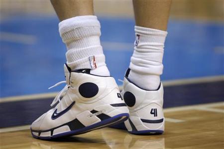 A brace is seen on Dallas Mavericks Nowitzki's ankle during second half NBA action against the Warriors in Dallas A brace is seen on Dallas Mavericks Nowitzki's ankle during second half NBA action against the Warriors in Dallas