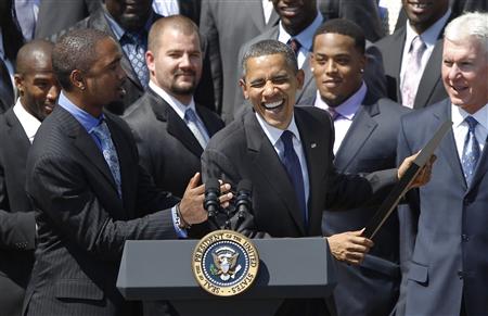 U.S. President Obama laughs with Charles Woodson as he honours the Green Bay Packers at the White House in Washington U.S. President Obama laughs with Charles Woodson as he honours the Green Bay Packers at the White House in Washington