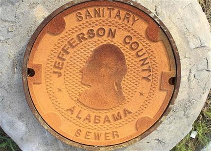 A manhole cover bears the logo/design of Jefferson County, Alabama A manhole cover bears the logo/design of Jefferson County, Alabama