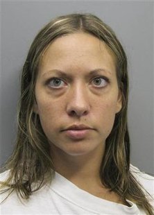 The booking photo of Lee Grace Dougherty, 29, provided by the Pueblo County Colorado Sheriff's Office The booking photo of Lee Grace Dougherty, 29, provided by the Pueblo County Colorado Sheriff's Office
