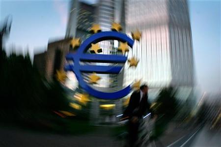 The euro sculpture is seen in front of the European Central Bank headquarters in Frankfurt The euro sculpture is seen in front of the European Central Bank headquarters in Frankfurt