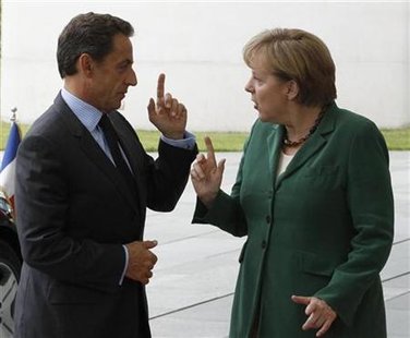 German Chancellor Merkel welcomes France's President Sarkozy before talks in Berlin German Chancellor Merkel welcomes France's President Sarkozy before talks in Berlin