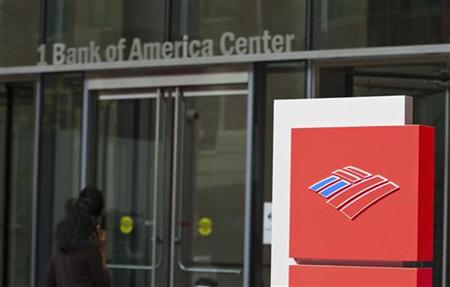 A Bank of America shareholder walks into the corporate headquarters prior to the start of the annual shareholders meeting in Charlotte A Bank of America shareholder walks into the corporate headquarters prior to the start of the annual shareholders meeting in Charlotte