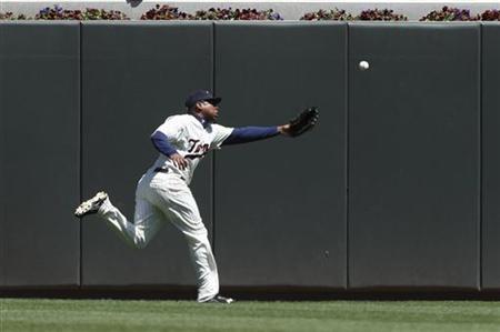 Minnesota Twins' Young fails to catch a two-RBI double by Toronto Blue Jays' Hill in Minneapolis Minnesota Twins' Young fails to catch a two-RBI double by Toronto Blue Jays' Hill in Minneapolis