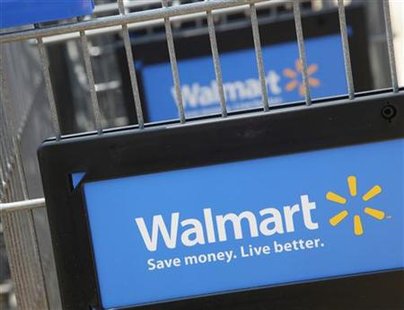 Shopping carts are seen outside a new Walmart Express store in Chicago Shopping carts are seen outside a new Walmart Express store in Chicago