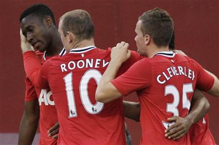 Manchester United's Nani celebrates his goal against Barcelona with teammates Danny Welbeck, Wayne Rooney and Tom Cleverley during their 201 Manchester United's Nani celebrates his goal against Barcelona with teammates Danny Welbeck, Wayne Rooney and Tom Cleverley during their 201