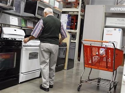 A man shops for an oven at a Home Depot store in New York A man shops for an oven at a Home Depot store in New York
