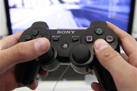 A person plays a video game at a Sony Playstation in Sony store in Berlin A person plays a video game at a Sony Playstation in Sony store in Berlin