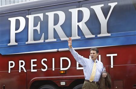 U.S. Republican presidential candidate Texas Governor Rick Perry walks to his bus after a campaign stop at D.C. Taylor Roofing in Cedar Rapi U.S. Republican presidential candidate Texas Governor Rick Perry walks to his bus after a campaign stop at D.C. Taylor Roofing in Cedar Rapi