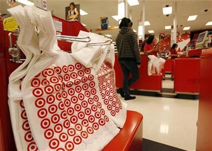 A shopper stands at a checkout counter at a Target store in Los Angeles A shopper stands at a checkout counter at a Target store in Los Angeles