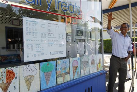 U.S. President Obama waves to onlookers as he buys ice cream during a bus tour in DeWitt, Iowa U.S. President Obama waves to onlookers as he buys ice cream during a bus tour in DeWitt, Iowa