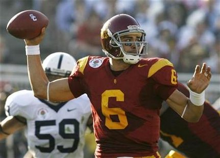 USC quarterback Sanchez throws a pass as he is chased by Penn State's Maybin during the first quarter of the 95th Rose Bowl Game in Pasadena USC quarterback Sanchez throws a pass as he is chased by Penn State's Maybin during the first quarter of the 95th Rose Bowl Game in Pasadena