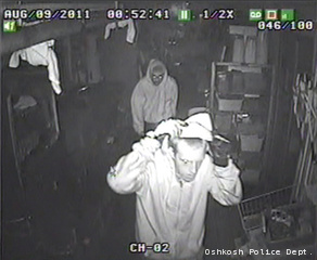 This still frame taken from surveillance video shows two people Oshkosh police say burglarized buildings on the city's west and north sides, Aug. 9, 2011.
This still frame taken from surveillance video shows two people Oshkosh police say burglarized buildings on the city's west and north sides, Aug. 9, 2011.