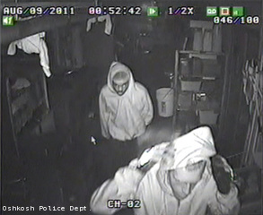 This still frame taken from surveillance video shows two people Oshkosh police say burglarized buildings on the city's west and north sides, Aug. 9, 2011.
This still frame taken from surveillance video shows two people Oshkosh police say burglarized buildings on the city's west and north sides, Aug. 9, 2011.
