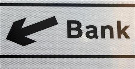 Directions to the Bank district are seen on a sign in the City of London Directions to the Bank district are seen on a sign in the City of London