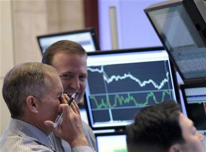 Traders work on the floor of the New York Stock Exchange Traders work on the floor of the New York Stock Exchange