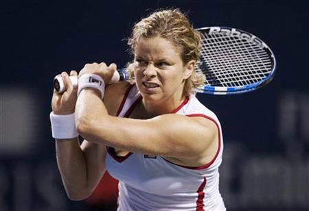 Clijsters returns a shot to Zheng at the Rogers Cup women's tennis tournament in Toronto Clijsters returns a shot to Zheng at the Rogers Cup women's tennis tournament in Toronto