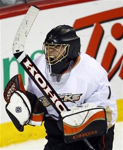 Anaheim Ducks goalie Hiller celebrates their overtime shootout win over the Montreal Canadiens during their NHL hockey game in Montreal