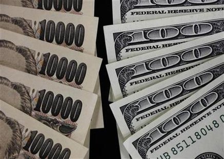 A picture illustration shows U.S. 100 dollar bank notes and Japanese 10,000 yen notes taken in Tokyo A picture illustration shows U.S. 100 dollar bank notes and Japanese 10,000 yen notes taken in Tokyo